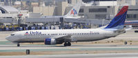 N372DA @ KLAX - Taxi to gate - by Todd Royer