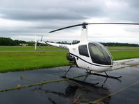 N8362L @ KUZA - R22 on ramp - by Connor Shepard
