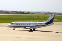 N602AB @ CID - Taxiing from Landmark to Runway 13 - by Glenn E. Chatfield