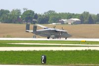 93-1319 @ CID - Blown right main tire after landing 27.  3/4 mile from me, the photo was shot with 1.7X converter on 450mm and is cropped - by Glenn E. Chatfield