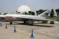 31681 - Shenyang J-5   Located at Datangshan, China - by Mark Pasqualino