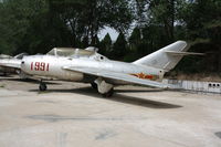1991 - MiG-15 UTI - by Mark Pasqualino