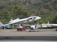 N57LG @ SZP - 1983 Godsey/Savier VARI-EZE 'Delaminator III', Continental O-200 100+ Hp, Light Speed Eng. ignition, Takeoff climb Rwy 22, Holder of FAI Class C-1.A world records: 1,000 km at 203.67 mph; 2,000 km at 200.12 mph. Many speed mods. - by Doug Robertson