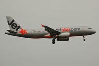 VH-VQD @ NZAA - On finals in the rain - by Micha Lueck