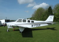 M-FOUR @ EGHP - SECOND BONANZA TO CARRY THIS REG. THE OTHER WAS AN A36 - by BIKE PILOT