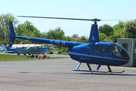 G-SPJE @ EGBG - Robinson R44 II calls in for fuel at Leicester 2009 May Bank Holiday Fly-in - by Terry Fletcher