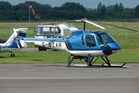 G-OZAR @ EGBJ - Enstrom 480 at Gloucestershire Airport - by Terry Fletcher