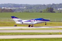 N106TW @ CID - Rotating on the take-off roll on Runway 27 - by Glenn E. Chatfield