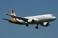 TS-INE @ EGCC - Libyan Airlines  Airbus A320-211 - by Chris Hall