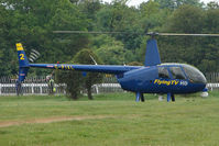G-PIXL - Robinson R44 II used to cover the horse racing for live TV from Epsom - by Terry Fletcher