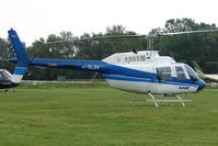 G-BLGV - One of the helicopters at Epsom on 2009 Derby Day