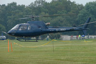 G-JBBZ - One of the helicopters at Epsom on 2009 Derby Day