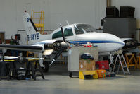G-BWYE @ EGPT - Cessna 310R on maintenance at Perth Airport in Scotland - by Terry Fletcher