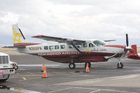 N306PW @ KABQ - First picture of this Caravan. Not a great weather in ABQ but some local characters... - by Philippe Bleus