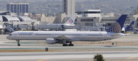 N77865 @ KLAX - Departing LAX on 25R - by Todd Royer