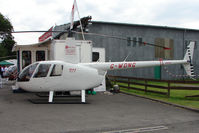 G-WDNG @ EGTB - Robinson R44 exhibited at 2009 AeroExpo at Wycombe Air Park - by Terry Fletcher