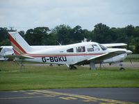 G-BGKU @ EGSF - PA-28R based at Conington - by Simon Palmer