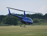 G-JORD @ EGLM - Robinson R44 II departing White Waltham - by moxy