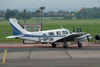 G-BPON @ EGBJ - Piper PA-34-200T at Staverton - by Terry Fletcher