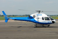 G-RIDA @ EGBJ - AS355NP at Staverton - by Terry Fletcher