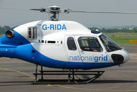 G-RIDA @ EGBJ - AS355NP at Staverton - by Terry Fletcher