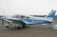 N4264T @ KWWD - A 1972 Cherokee sits on the apron on a chilly, wet November day. - by Daniel L. Berek