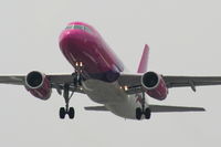HA-LPS @ EGGP - Wizzair Airbus A-320-232 - by Chris Hall