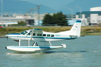 C-FJOE @ YVR - Landing at YVR - by metricbolt