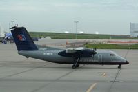 N448YV @ KDEN - DHC-8-200 - by Mark Pasqualino