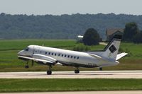 N727DL @ CID - Rotating on the take-off roll on Runway 13 - by Glenn E. Chatfield