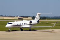 N192N @ CID - Taxiing to Landmark FBO.