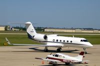 N192N @ CID - Taxiing to Landmark FBO.