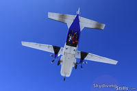 N467CS @ ORE - Skydivers exiting the CASA over Jumptown, Orange, MA. - by Dave G