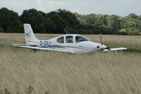 G-CDLY @ EGLG - G-CDLY arriving at Panshanger Airfield. Is the long grass to encourage wildlife ? - by Eric.Fishwick