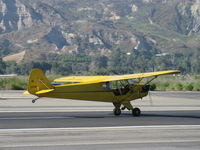 N2207M @ SZP - 1946 Piper J3C-65 CUB, Continental A&C65 65 Hp, landing roll Rwy 22 - by Doug Robertson