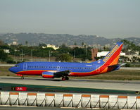 N388SW @ LAX - Southwest 1994 Boeing 737-3H4 in new colors w/o winglets - by Steve Nation