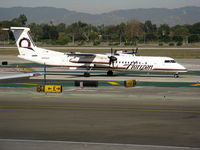 N404QX @ LAX - Horizon 2001 Bombardier DHC-8-402 taxiing - by Steve Nation