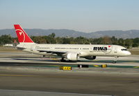N520US @ LAX - NWA Northwest Airlines 1986 757-251 taxiing to RW 24L - by Steve Nation