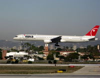 N583NW @ LAX - NWA Northwest Airlines 2002 757-351 landing on RW 24L - by Steve Nation