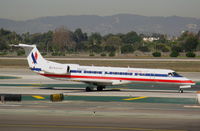 N806AE @ LAX - American Express 2001 Embraer EMB-135KL taxiing to RW 24L - by Steve Nation