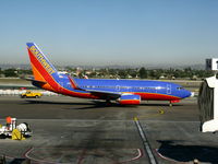 N907WN @ LAX - Southwest 2008 Boeing 737-7H4 in new colors w/winglets taxiing from gate - by Steve Nation