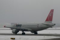 N333NW @ KMSP - Snowy day at MSP - by Kreg Anderson