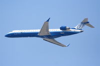 N715SK @ KLAX - United Express, (Skywest) Canadair CL-600-2C10 Regional Jet CRJ-700, N715SK,  departing 25R KLAX - by Mark Kalfas