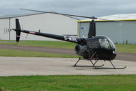 G-WIRL @ EGBJ - Robinson R22 at Gloucestershire (Staverton) Airport - by Terry Fletcher