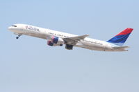 N677DL @ KLAX - Delta Airlines Boeing 757-232,  N677DL departing 25R KLAX - by Mark Kalfas
