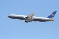 N665UA @ KLAX - United Airlines 767-322, N665UA departs KLAX RWY 25R - by Mark Kalfas