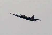 N93012 @ KDPA - Boeing B-17G, NL93012, a climbing left turn to 270' after departing RWY 20R KDPA... - by Mark Kalfas