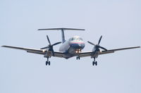 N295SW @ KLAX - Skywest Embraer EMB-120ER, N295SW short final RWY 24R KLAX. - by Mark Kalfas