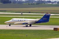 N881P @ CID - Taxiing to Runway 27 for departure - by Glenn E. Chatfield