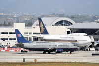 N398UA @ KLAX - United Airlines Shuttle Boeing 737-322, N398UA taxiing KLAX. - by Mark Kalfas